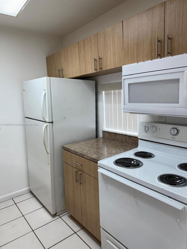 Building Photo - 8550 N Sherman Cir