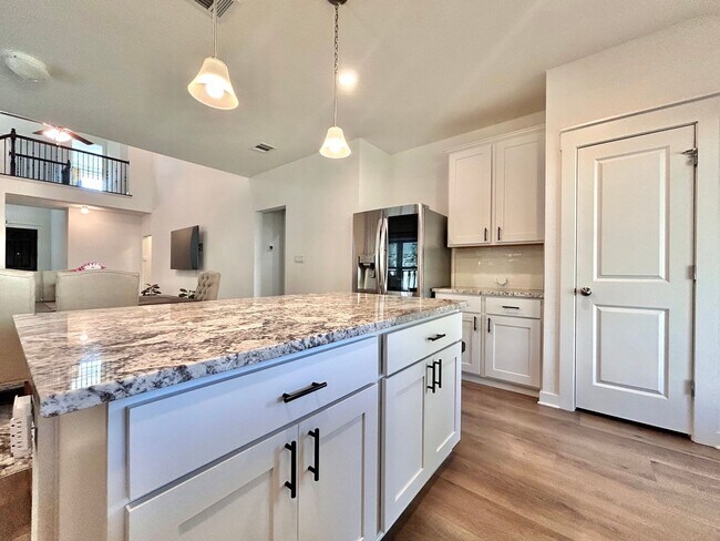 Building Photo - Inviting 4-Bed, 2.5-Bath Home with High Ceilings and Covered Deck