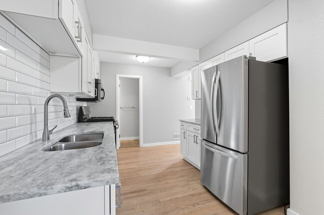 Building Photo - 3-bedroom, 2.5 bathroom home across the st...
