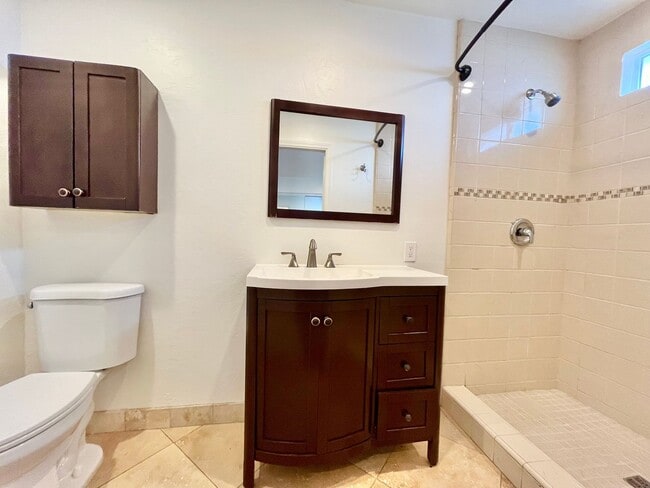 Building Photo - 4BR/3BA Large House - Single Story, No Carpet, AC, Washer/Dryer in Unit, Small Yard, 2 Car Garage...