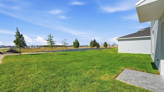 Building Photo - 10761 NW Everbreeze Dr