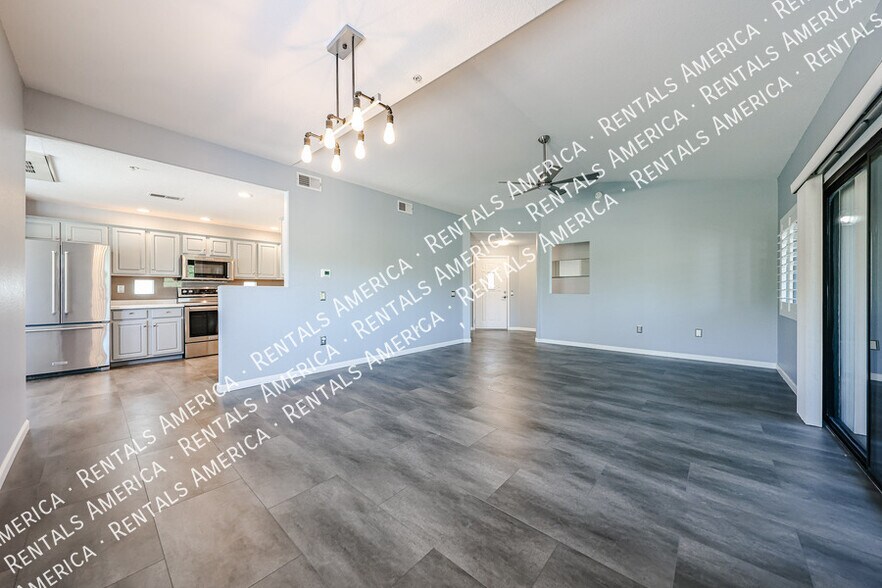 Building Photo - 9555 E Raintree Dr
