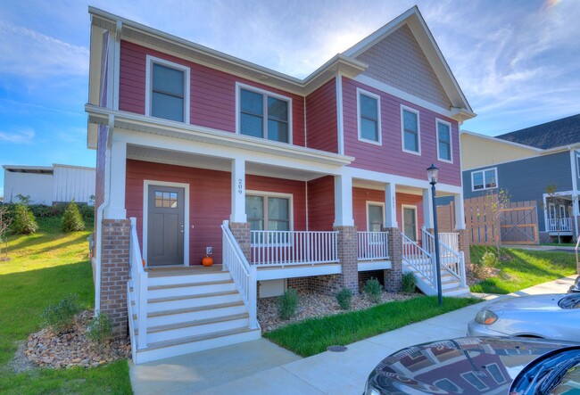 Primary Photo - Four Bedroom Townhome in Uptown Village