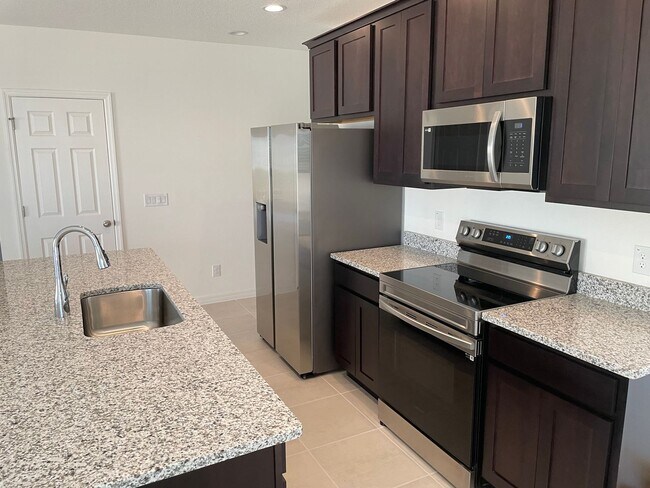 Building Photo - Brand New 4 bedroom 2 bath home - corner lot