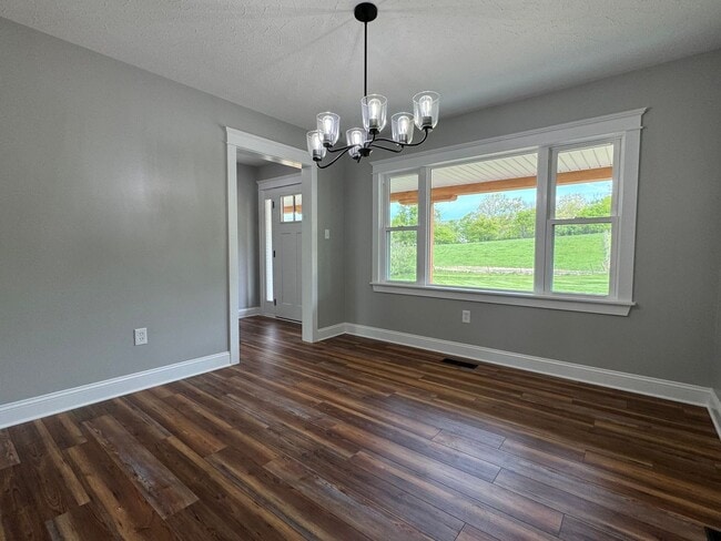 Building Photo - Exquisite Brick Ranch with Modern Upgrades, Countryside Charm And Two Car Garage