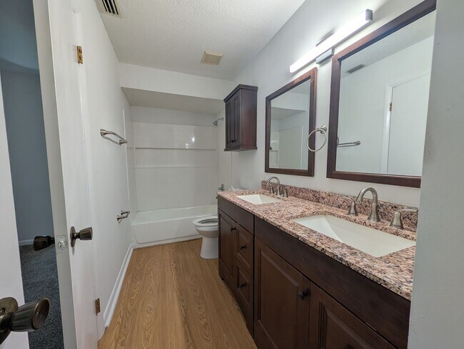 Building Photo - NOW AVAILABLE! Upgraded 3 Bedroom, 2 Bath Townhome with a Fenced yard, and close to NAS Jax and I...