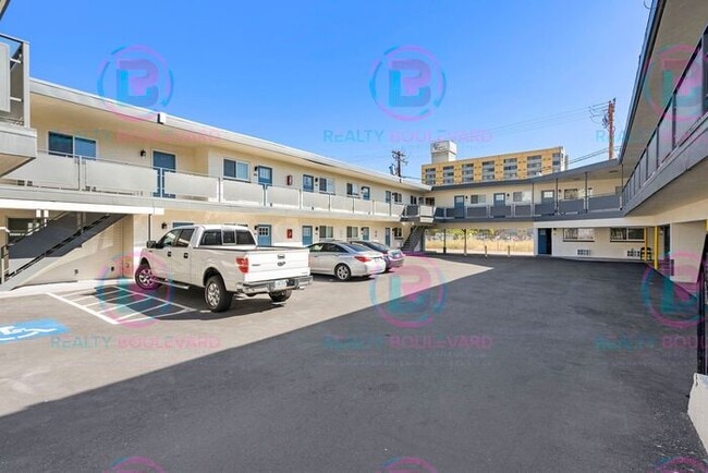 Building Photo - Studio apartment available now in the hear...