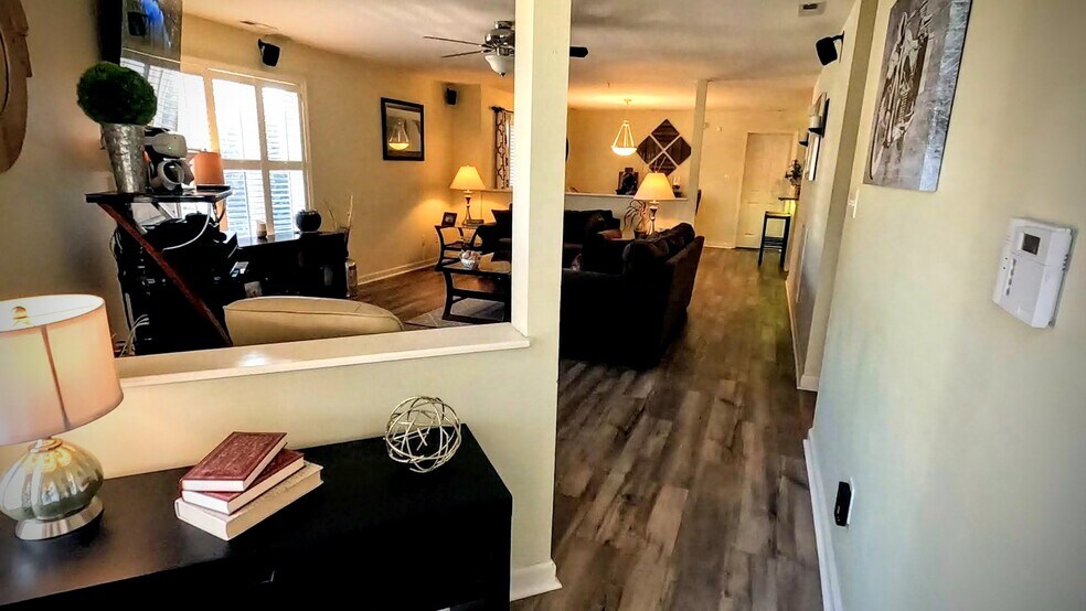 View from the front door opening into the open-concept floor plan and main living area. - 424 Commerce Ave