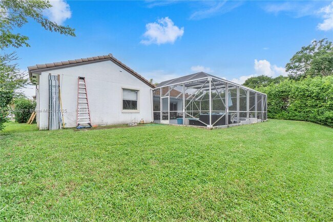 Building Photo - 9251 NW 42nd Ct