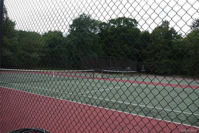 Building Photo - 5307 Villa at the Woods