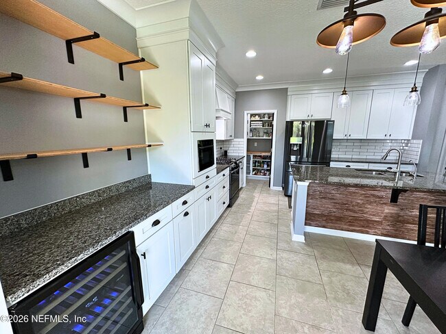 Building Photo - 7048 Rosabella Cir