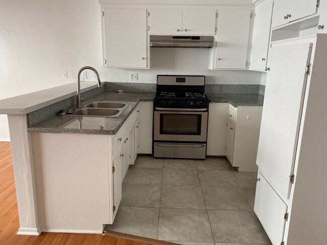Big functional kitchen. - 1731 N Normandie Ave
