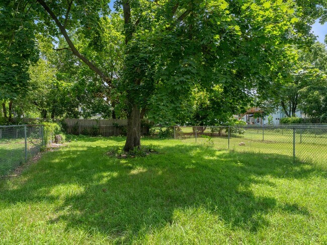 Building Photo - Renovated 3-Bedroom Apartment with Bonus Finished Attic & Spacious Shared Backyard