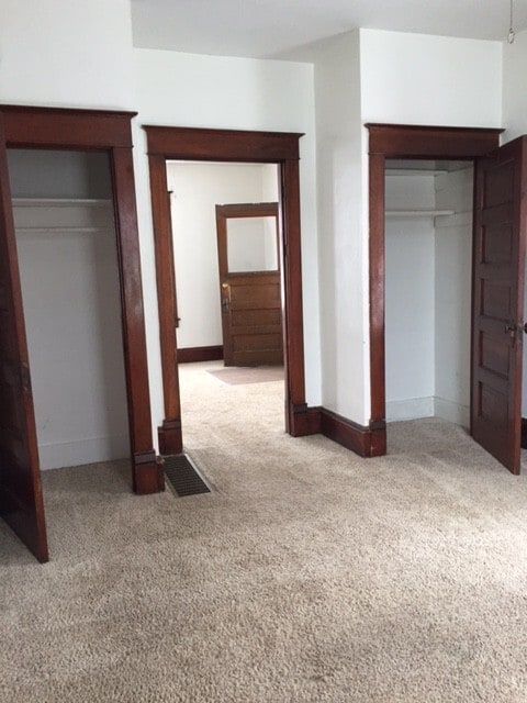 Building Photo - Corner lot with fenced yard!