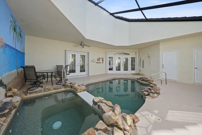 Building Photo - "Waterfront home with Courtyard Pool"