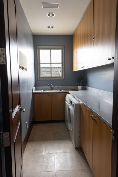upstairs laundry room - 207 Via Jucar