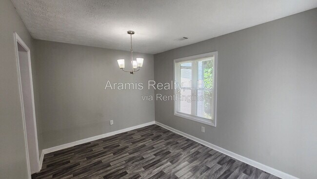 Building Photo - 5566 Windwood Rd