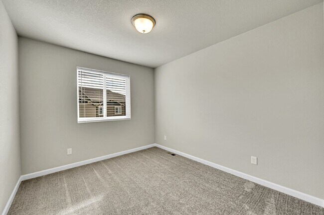 Building Photo - $2,040.95 -  3 bed, 2.5 bath Townhome in CO Springs with Central AC!