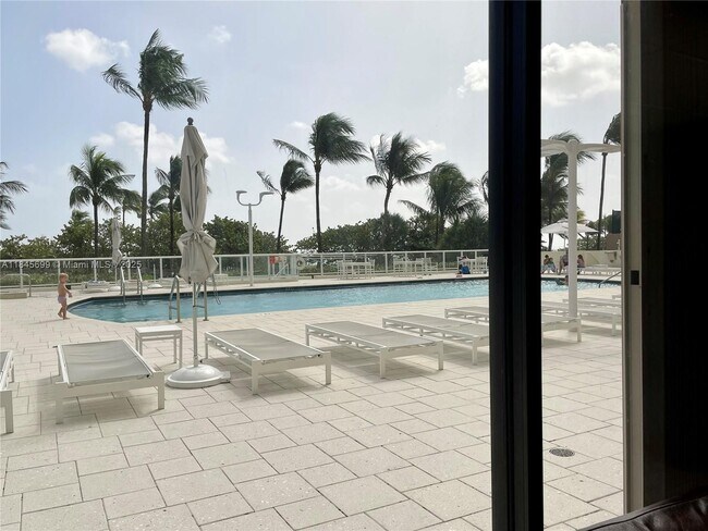Building Photo - 10185 Collins Ave