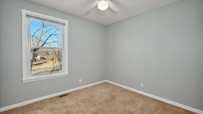 Building Photo - Now Ready : 4BR, 1 1/2BA home with fenced in back yard and storage building.