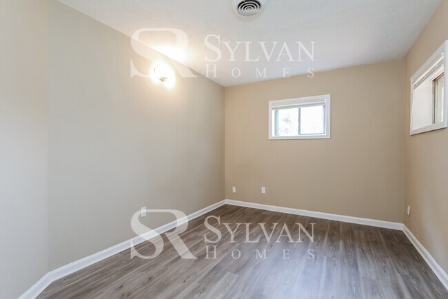 Building Photo - This charming home is ready for you!