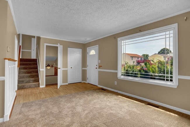 Building Photo - Spacious 4-Level Home with Deck, Workshop ...