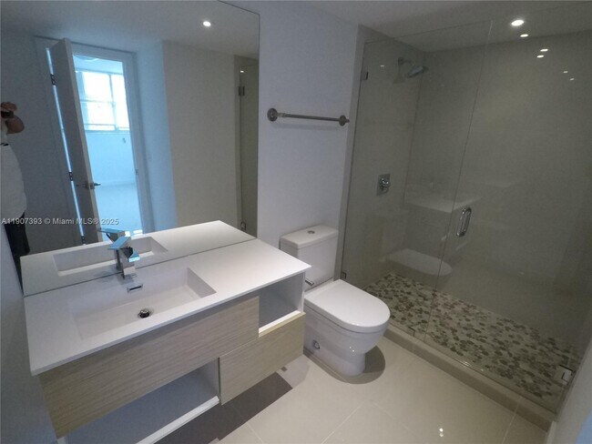 Building Photo - 10230 Collins Ave