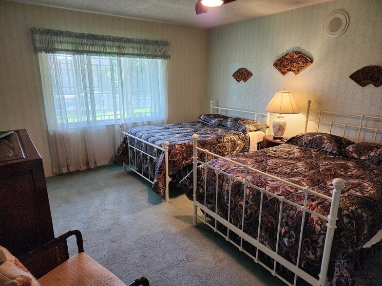 Room #2 can accommodate two people comfortably, or can be modified for one person. - 317 W Banbury Dr