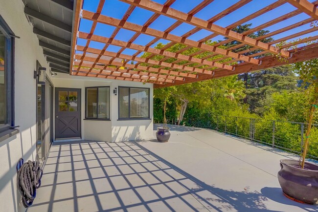 Spacious back patio offers views and living space - 556 Luton Dr