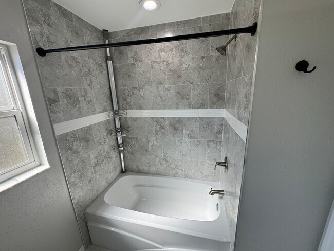 Building Photo - Your Dream Home Awaits! MASSIVE Backyard! ...