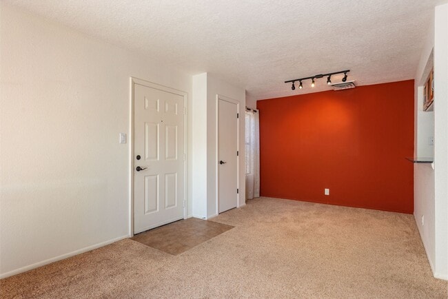 Building Photo - Light and Bright Second Level Condo Available Now!