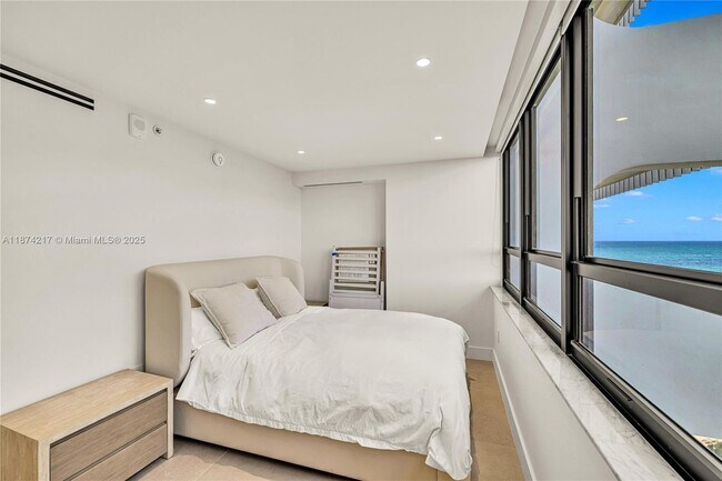 Building Photo - 10205 Collins Ave