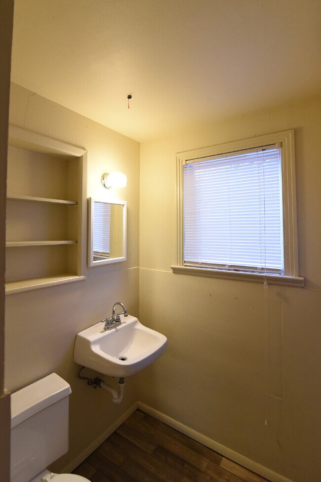 Building Photo - Half Off First Full Month's Rent! Rear Home Nestled In Texas Tech and Downtown Metro Area