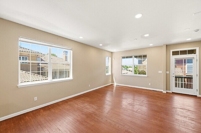 Building Photo - $2,640.95 -  3 Bed, 2.5 Bath Townhome in Denver with Attached Garage and Central AC!