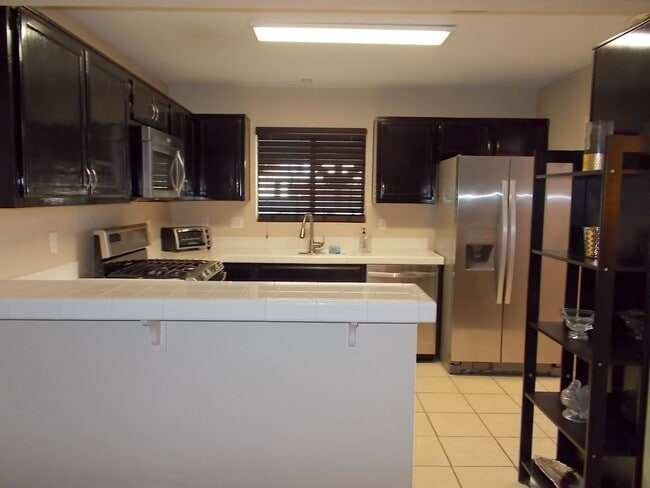 Building Photo - Comfort & Space in a Furnished Home