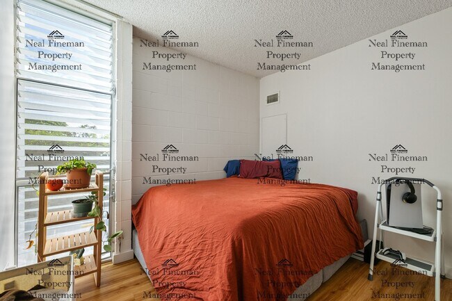 Building Photo - Unfurnished  1 Bed / 1 Bath Condo. 1 assigned covered parking stall. Rent Includes: AC Central, C...