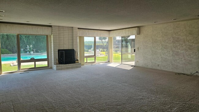 Building Photo - 7686 S Temperance Ave