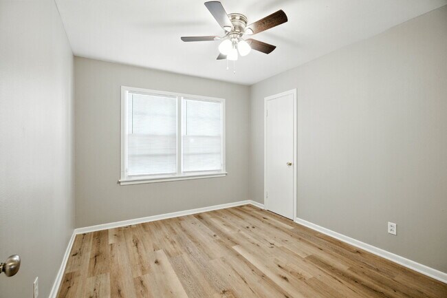 Building Photo - Fresh Paint, New Floors, and a Fresh Start!