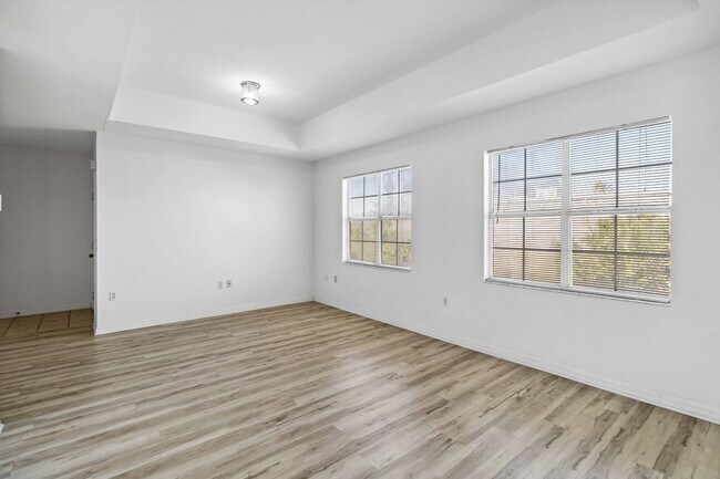 Building Photo - Spacious 1-Bedroom Condo for Annual Rent available now in gated Villagio Community