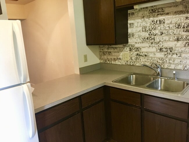 Building Photo - Beautiful Two-story, 3 Bed, 1.5 Bath Condo 1/2 Mile from CSU!