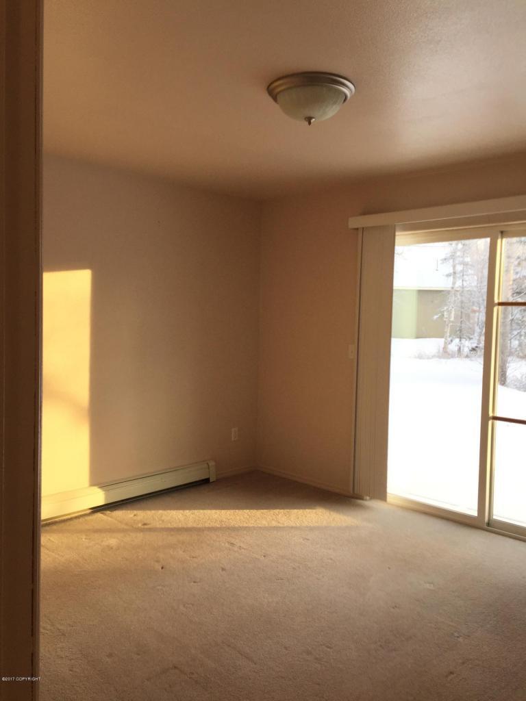 Downstairs bedroom-winter - 320 E Victor Cir