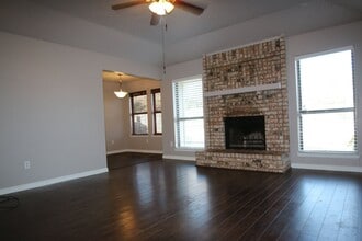 Building Photo - Cozy 3/2 Burleson Charmer | Wood-Burning Fireplace | 2-Car Garage | Pet-Friendly