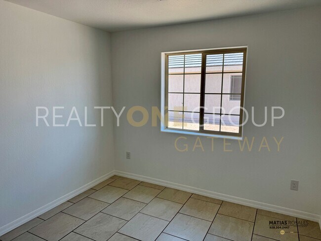 Building Photo - Three Bedroom Two Bath Home with All Tile ...