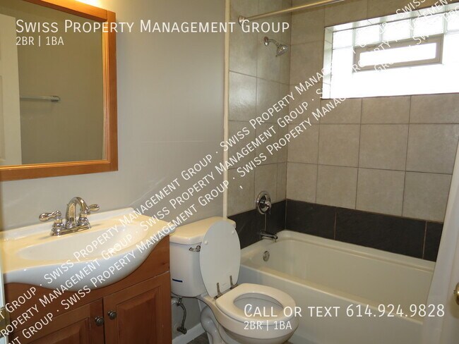 Building Photo - A Charming 2-Bedroom Apartment with Baseme...