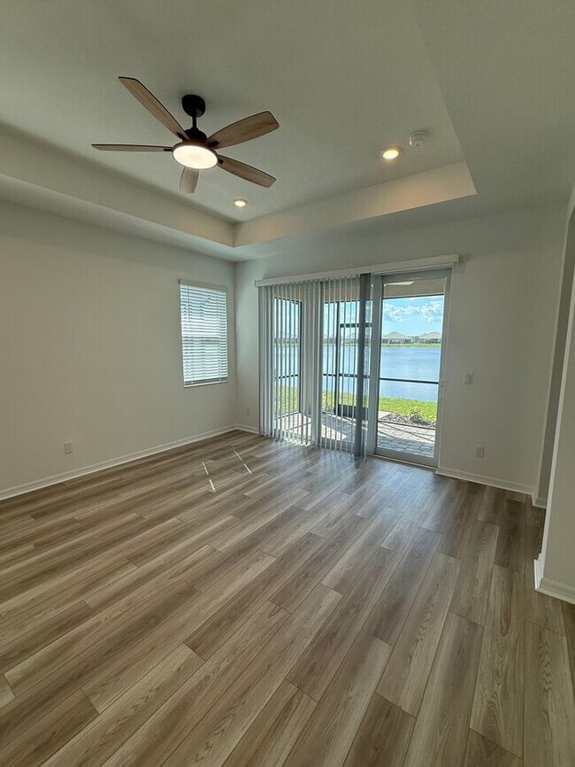 Building Photo - 2BR 2BA Home w/ Quartz Island Kitchen + Pond View Lanai + 2-Car Garage in Lakewood Ranch