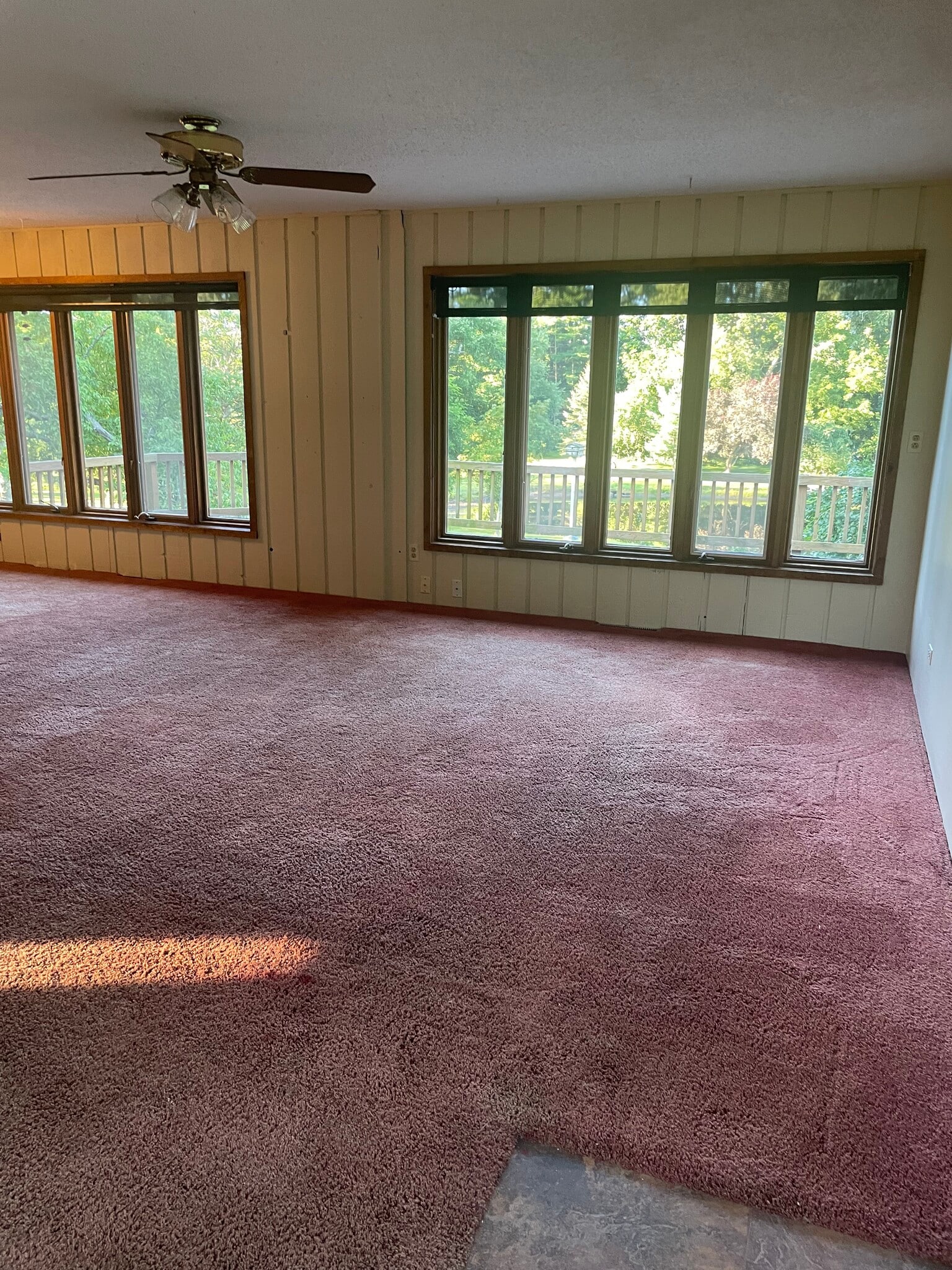living room with windows overlooking property and pond - 26332 N Il Route 59