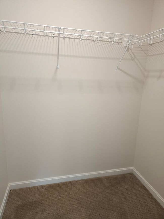 Building Photo - A Flexible Floor Plan That Adapts to You - One Bedroom with Den Apartment