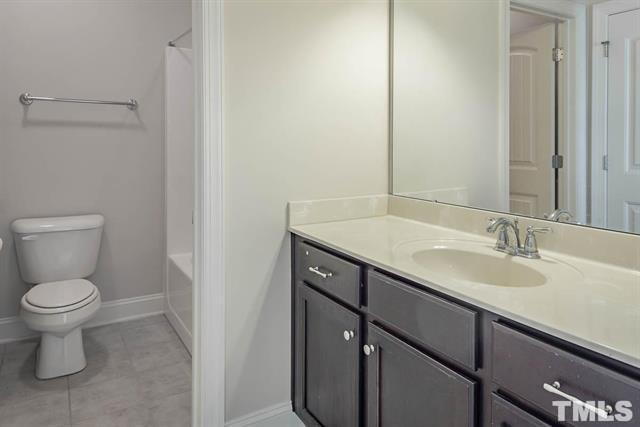 Building Photo - Beautiful 4-Bedroom Stone Front Home in Prime West Cary Location with Fenced Backyard & Resort-St...