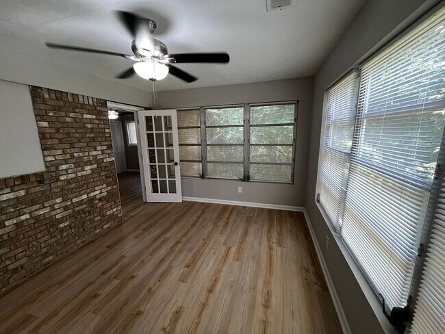 Building Photo - Must See the Sunroom off the Primary Bedroom!