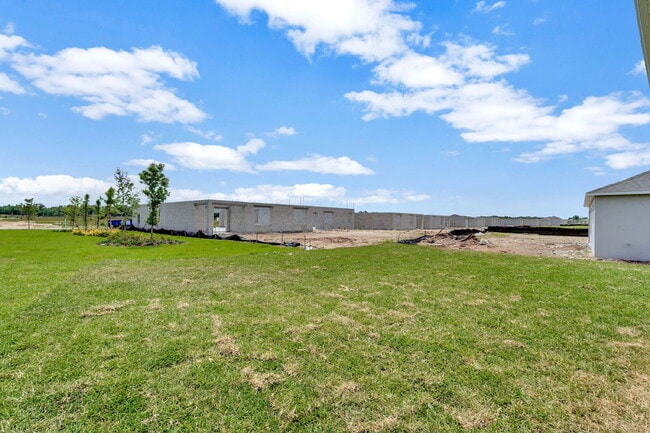 Building Photo - 4 bedrooms and 2 bathrooms, the spacious 1,828 sq ft home features an open concept with a 2 car g...